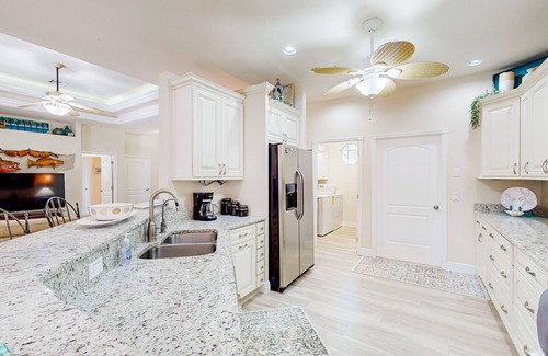 North Port House | Dog-friendly house with heated pool, pool spa, central AC, washer/dryer, & lanai
