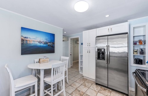 Fort Myers Beach Apartment | Dog Friendly, Large Heated Pool, Short Walk to Restaurants and Beach!