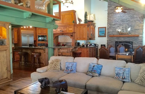 Bass Lake House | Dog-friendly, lake view home with a boat slip, three decks, fireplace & WiFi