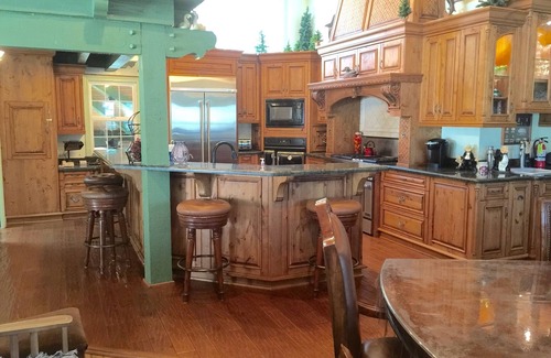 Bass Lake House | Dog-friendly, lake view home with a boat slip, three decks, fireplace & WiFi