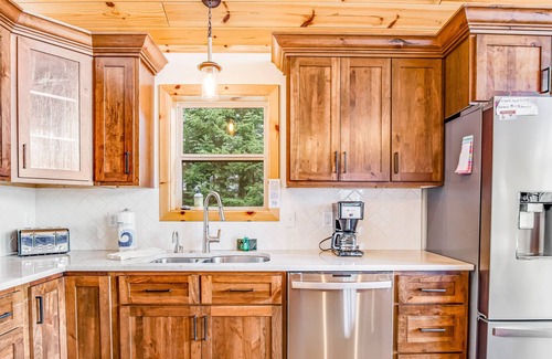 Arbor Vitae House | Dog-friendly lakefront home - dock, private sauna, fireplace & fiber optic WiFi
