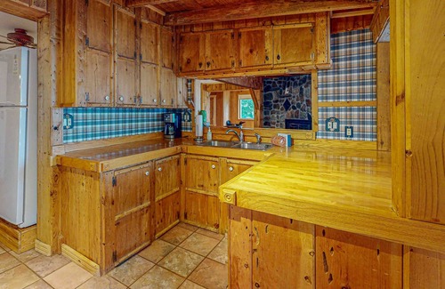 Presque Isle House | Dog-friendly lakefront home with boat access, deck, fireplace, gas grill, kayaks