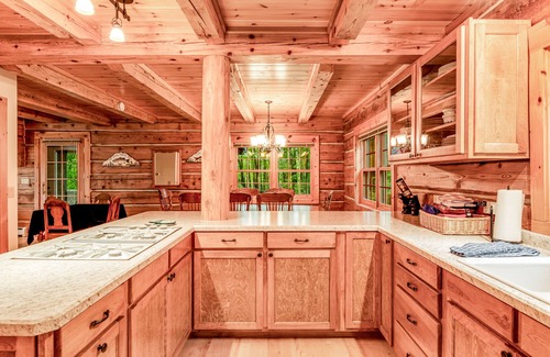 Presque Isle House | Dog-friendly, lakefront home with a wood fireplace, decks, dock, & AC