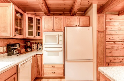 Presque Isle House | Dog-friendly, lakefront home with a wood fireplace, decks, dock, & AC