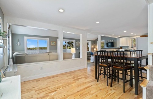 Acton House | Dog Friendly Lakefront Cottage with Private Dock and Kayaks