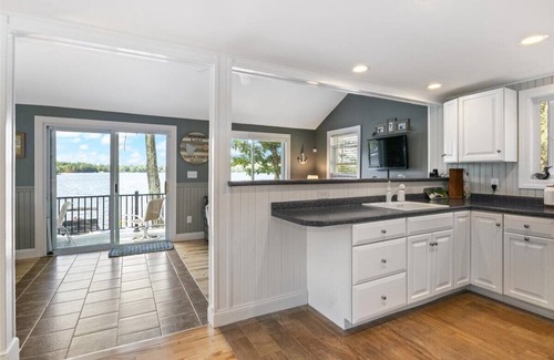 Acton House | Dog Friendly Lakefront Cottage with Private Dock and Kayaks