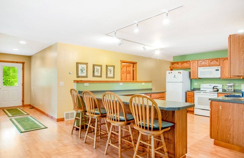 Phelps House | Dog-friendly, lakefront retreat with a deck, gas grill, & washer/dryer