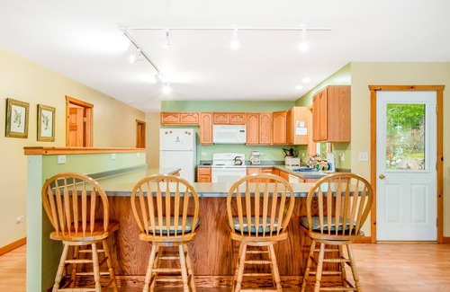 Phelps House | Dog-friendly, lakefront retreat with a deck, gas grill, & washer/dryer