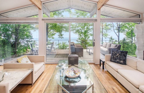 Harbert House | Dog-friendly lakefront house with private hot tub, outdoor pool, beach, WiFi