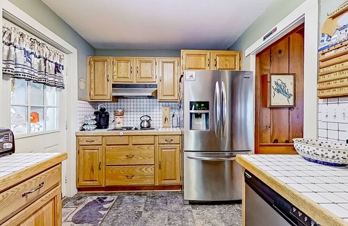 Meredith Cottage | Dog-friendly lakefront cottage with private dock, air hockey, water access, W/D