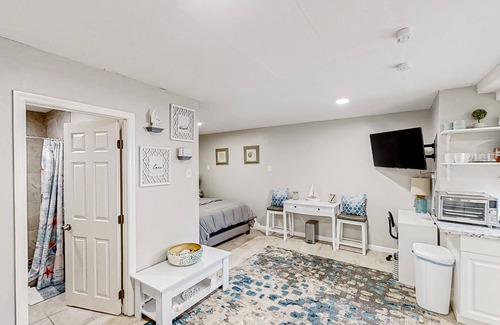 Bearss Plaza Apartment | Dog-friendly, lakeview retreat with kitchenette, yard, & electric grill