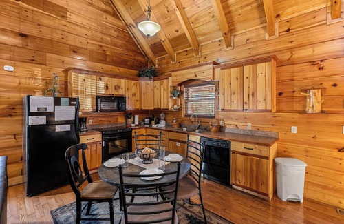 Gatlinburg - Pigeon Forge Cabin | Dog Friendly! Private Indoor Pool, Hot Tub, GameRoom, Firepit & Free Passes.