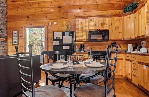 Gatlinburg - Pigeon Forge Cabin | Dog Friendly! Private Indoor Pool, Hot Tub, GameRoom, Firepit & Free Passes.