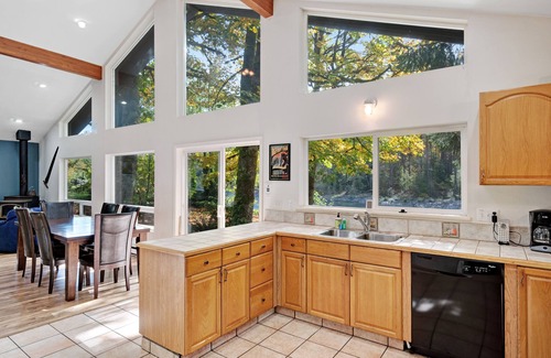 Baring Cabin | Dog-friendly riverfront cabin w/Private Hot Tub, Wood Stove, near Ski resort
