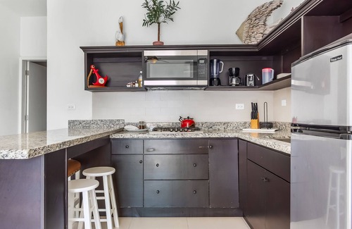 La Paloma House | Dog-friendly suite with beach views, outdoor pool, patio, kitchenette, & AC