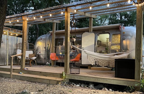 Berryville House | Dog-friendly vintage camper with grill, firepit, river access, & outdoor theater