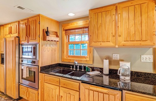 Eagle River House | Dog-friendly waterfront cabin w/wood-burning fireplace, boat dock, & firepit