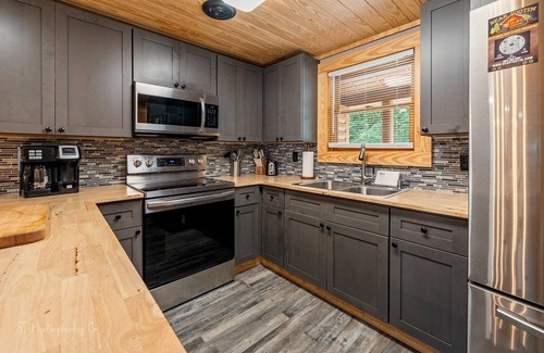 Caton Condo | Dolly's # 2 2 Bedroom Condo by RedAwning