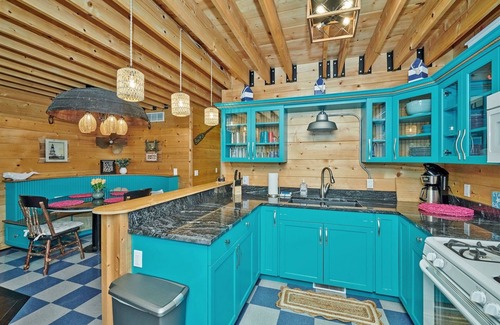 Fennville House | DollyBrook 9: Relax in your private hot tub or jump in the association pool