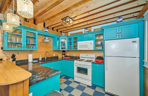 Fennville House | DollyBrook 9: Relax in your private hot tub or jump in the association pool