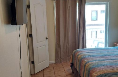 South Padre Island Apartment | Dolphin Jump Steps to the Beach