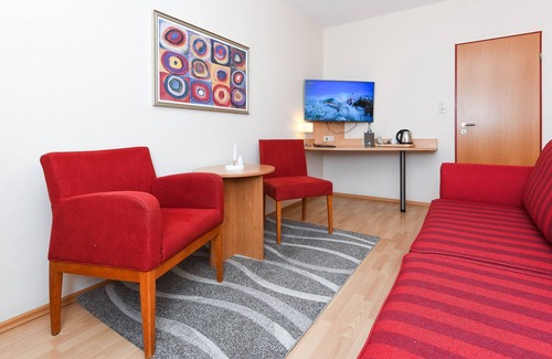 Esens Cottage | Doppelzimmer Helgoland - Pension Nordkap in Bensersiel
