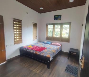 Kalpetta House | Dormitory with attached bathroom