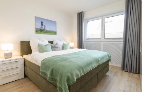 Dorumer Neufeld Apartment | Dorumer Sielhuus 4 - Ferienwohnung mit Garten und Sauna