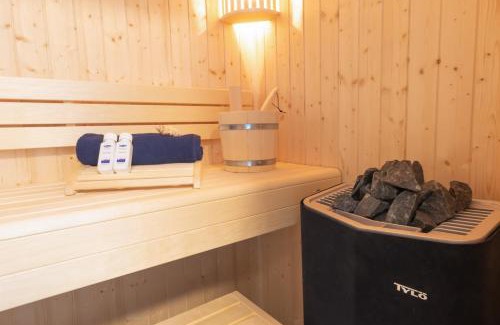 Dorumer Neufeld Apartment | Dorumer Sielhuus 4 - Ferienwohnung mit Garten und Sauna