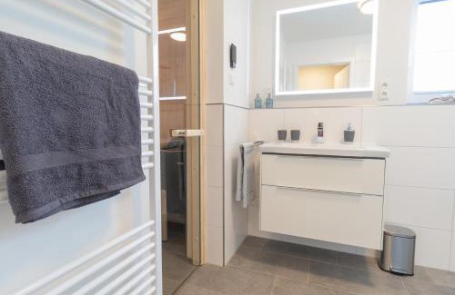 Dorumer Neufeld Apartment | Dorumer Sielhuus 4 - Ferienwohnung mit Garten und Sauna