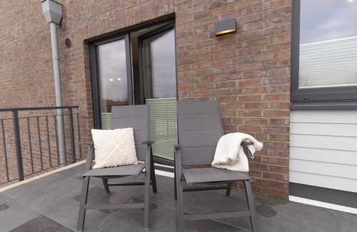 Dorumer Neufeld Apartment | Dorumer Sielhuus 12 - Strandnah mit Sauna und Balkon