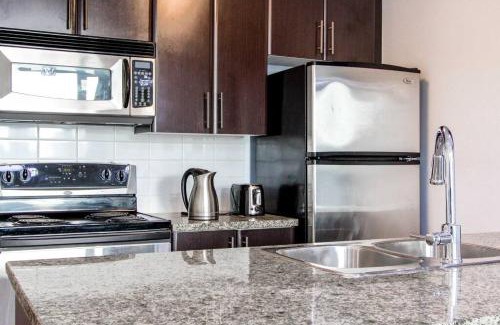 Crosstown Apartment | Downtown 1 Bedroom Water View Condo