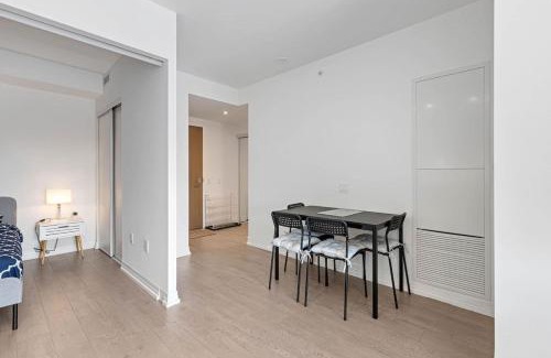 Garden District House | Downtown 2 bedroom Condo with Private Balcony