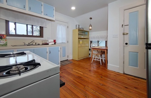 Manistee House | Downtown home blocks to the beach w/king bed, deck fire pit & air conditioning