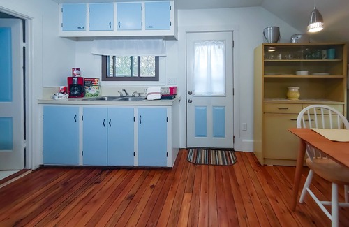 Manistee House | Downtown home blocks to the beach w/king bed, deck fire pit & air conditioning