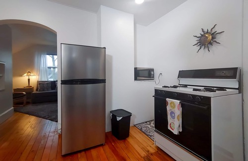 Manistee House | Downtown home blocks to the beach w/king bed, deck fire pit & air conditioning