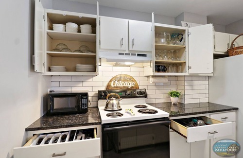 Lake Geneva Apartment | Downtown Lake Geneva-Chicago |Above Shops on Main |Onsite Parking |Fun Themed Urban Apartment |King