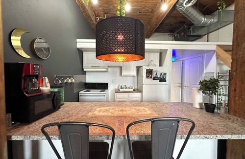Detroit Apartment | Downtown: Riverfront Chillout Loft w Projector
