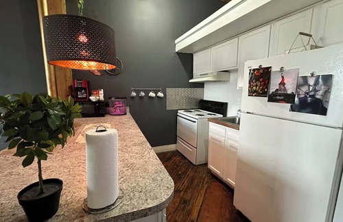 Detroit Apartment | Downtown: Riverfront Chillout Loft w Projector