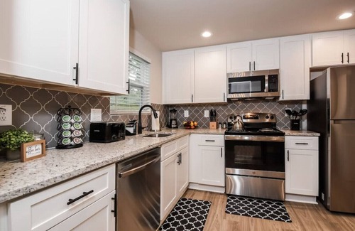 Browns Mill Park House | Dreamy Downstairs Unit of Guest Home with Private Patio, BBQ Area & Yard Games!
