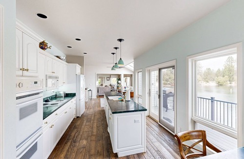 Hayden View Estates House | Dreamy lakefront gem with dock, water frontage, large deck & fast WiFi