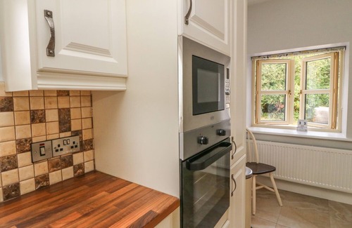 Glencar Cottage | DROMSTABLA, pet friendly in Glencar, County Kerry