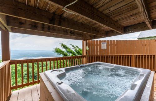 Bryant House | Eagles Nest Cabin with a private hot tub