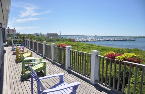 Montauk House | East Lake Dr. Lakefront home with a pool.