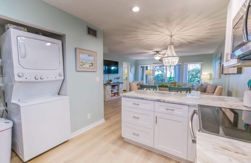 Butler Beach Condo | Easy walk to beach, 3 refreshing pools!