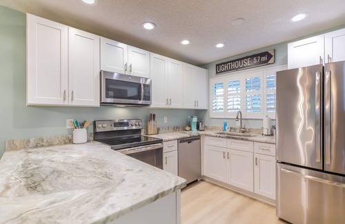 Butler Beach Condo | Easy walk to beach, 3 refreshing pools!