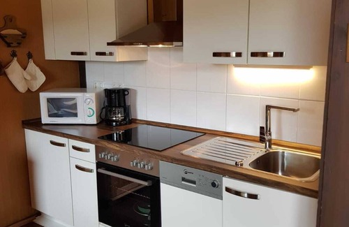 Fedderwardersiel House | Ebenerdiger Reihenendbungalow mit Eingezäunten Grundstück in Fedderwardersiel