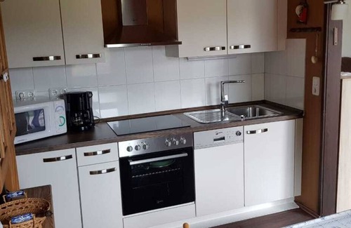 Fedderwardersiel House | Ebenerdiger Reihenendbungalow mit Eingezäunten Grundstück in Fedderwardersiel