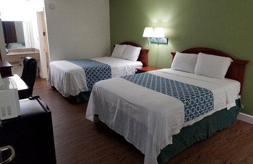National Gardens Hotel | Econo Inn