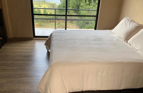 Choconta Cabin | El Refugio del Cobijo, Ideal cabin overlooking the reservoir and the mountains